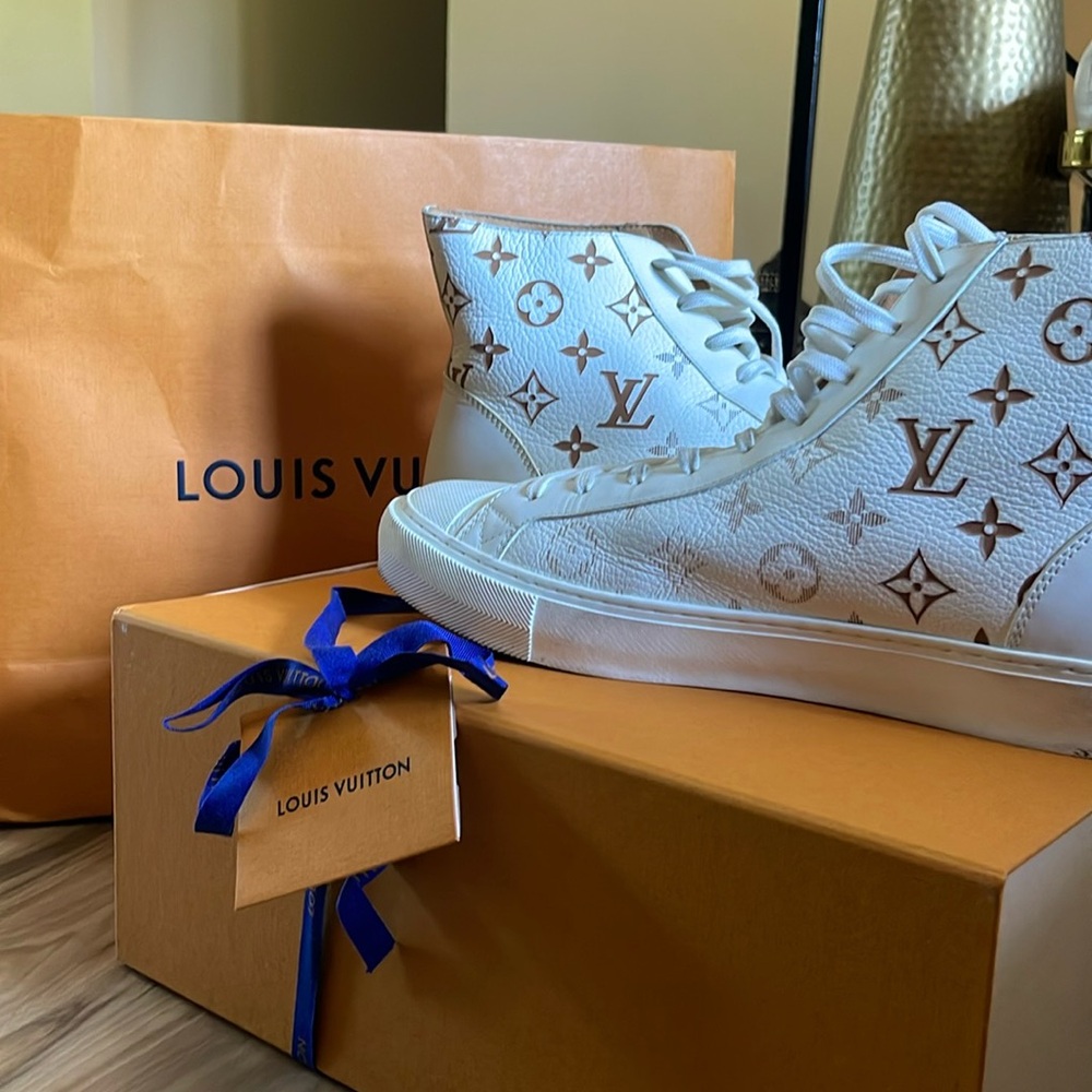 Louis Vuitton High Top Monogram sneakers .